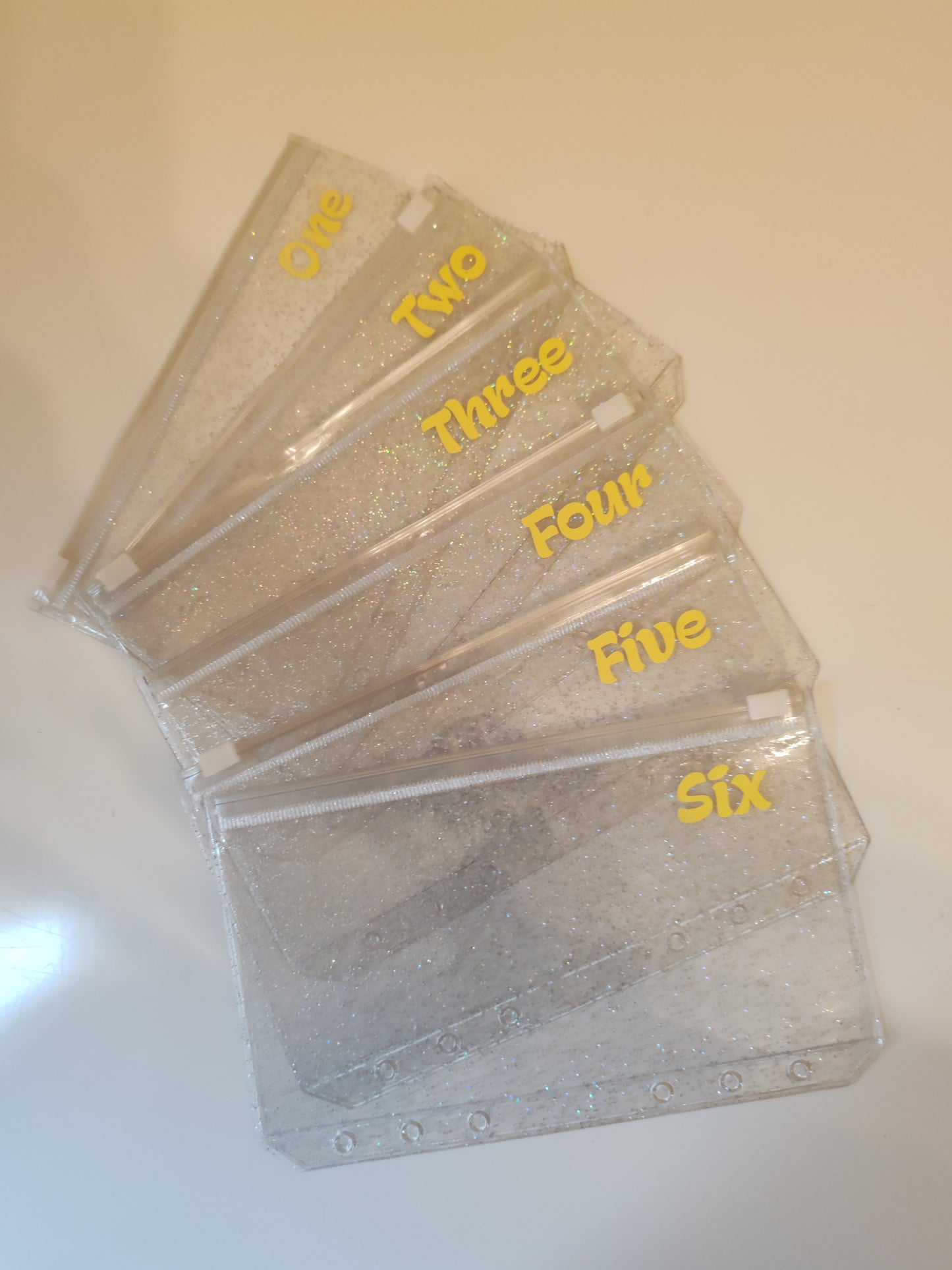 One - Six yellow vinyl A6 zip glitter envelope
